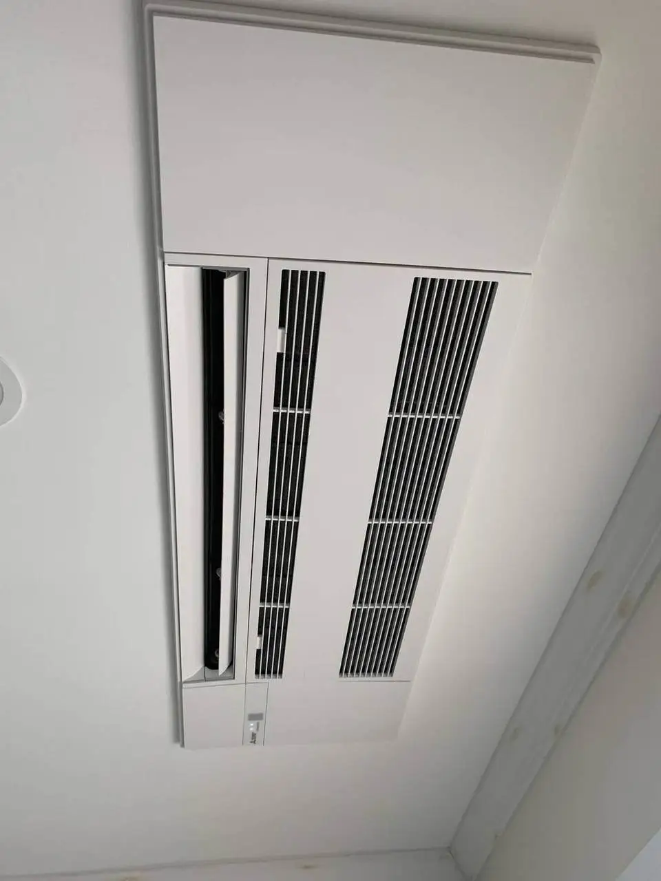 Ductless ceiling cassette installed by Electric A/C Inc