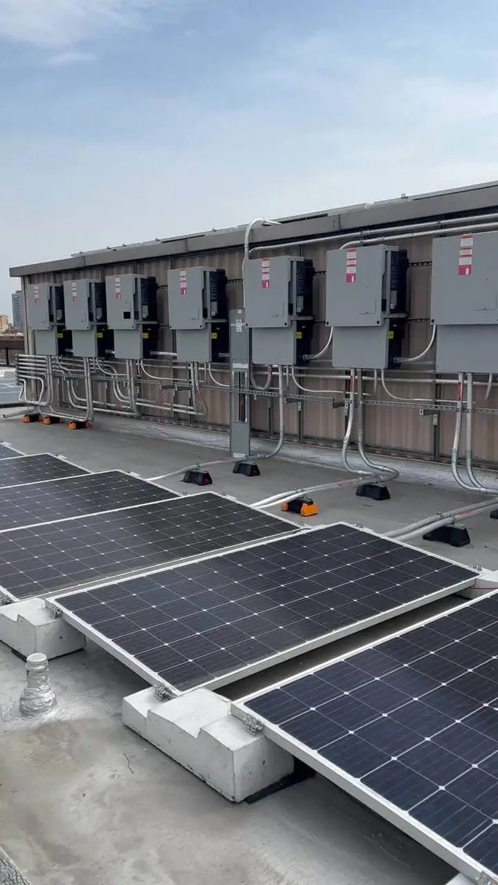 Wall of solar inverters wired by Electric A/C Inc