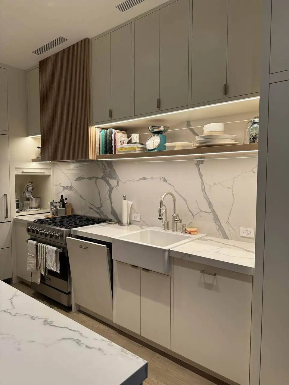 Marble kitchen with recessed and under-cabinet lighting installed by Electric A/C Inc in Queens